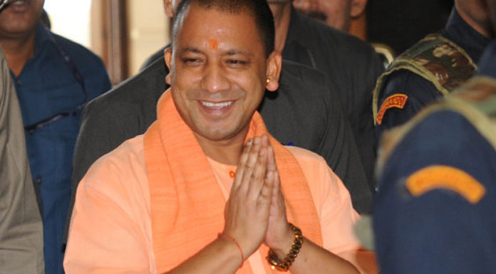 Yogi transfers money for self-help groups