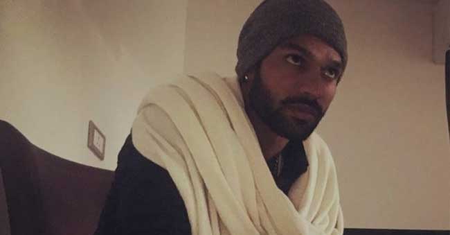 Shrikar Dhawan pushes away a fan!