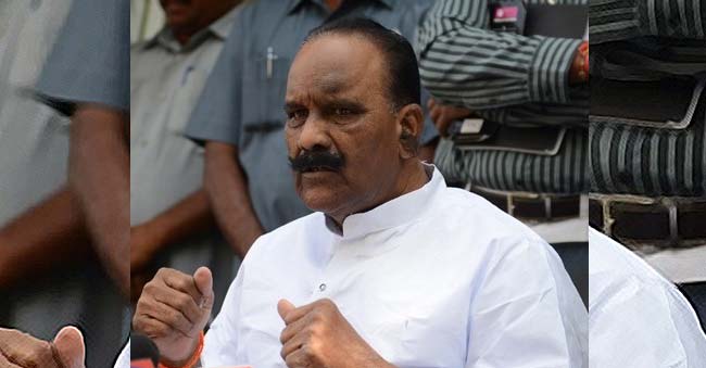 Water bottles thrown at Home Minister Naini Narasimha Reddy