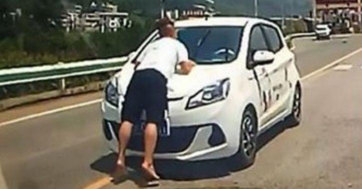 Wife Drives Five Kilometers With Her Husband On Car Bonnet 