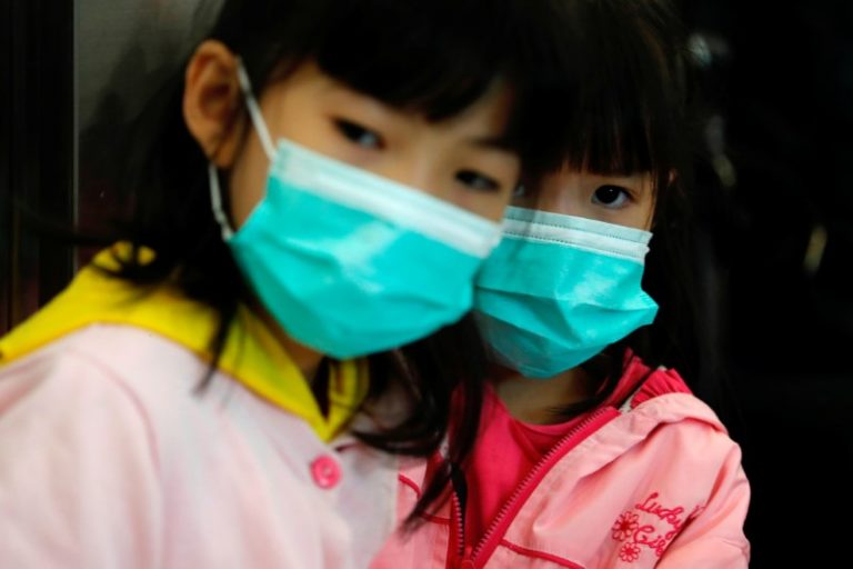 China closes transport in eight cities around virus epicentre