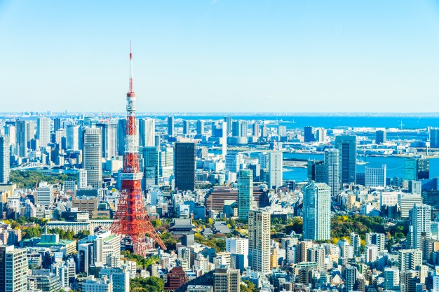 Tokyo starts new normal after lifting health alert