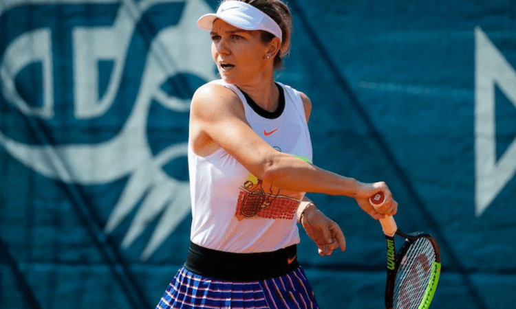 Halep beats Mertens to clinch Prague Open title