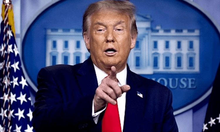 Trump awaits Covid-19 test results after aide infected