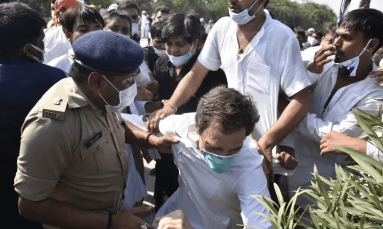 Rahul Gandhi pushed on ground, detained en route Hathras