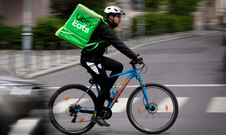 Uber lays off 185 workers at its food delivery service Postmates