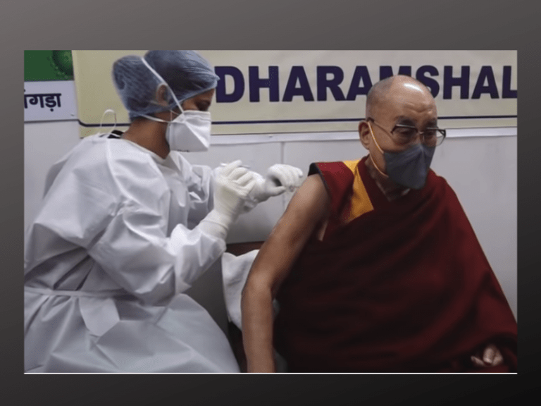 Dalai Lama receiving the first dose of COVID-19 vaccine at Zonal Hospital, Dharamsala
