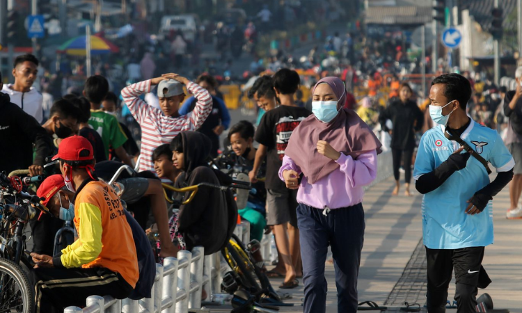 Indonesia extends public activity restrictions