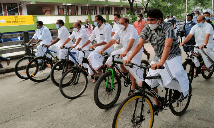 Kerala Oppn MLAs ride bicycles to Assembly in protest