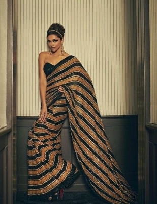 Deepika walks Cannes red carpet in a Sabyasachi sari inspired by the Royal Bengal tiger