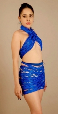 Bizarre: Urfi Javed dresses up in just blue wires!