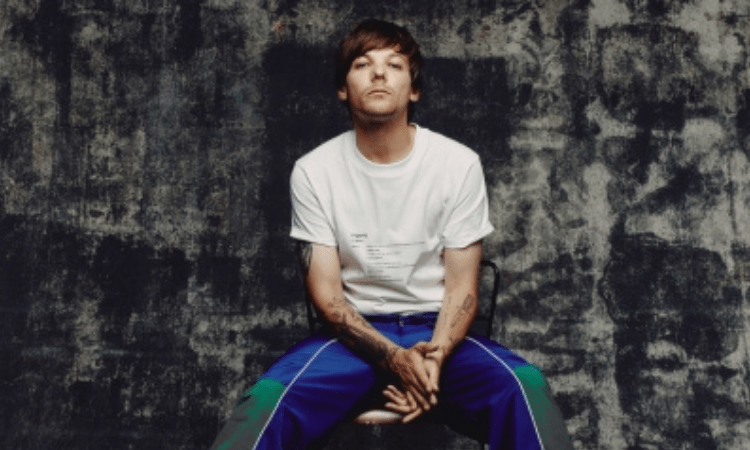 Louis Tomlinson says One Direction’s first album was ‘s**t’