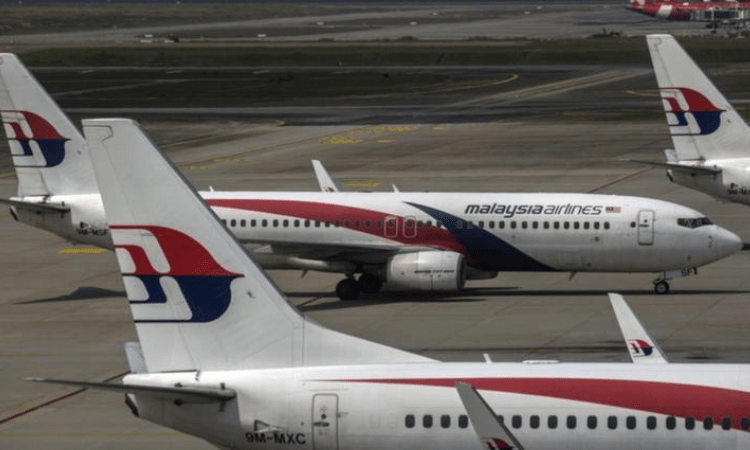 Families of those on board MH370 urge new search for missing plane