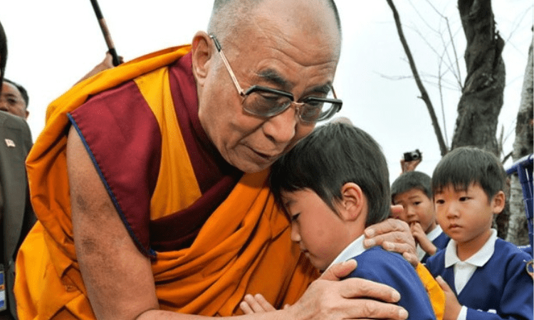 Dalai Lama apologises to boy, his family