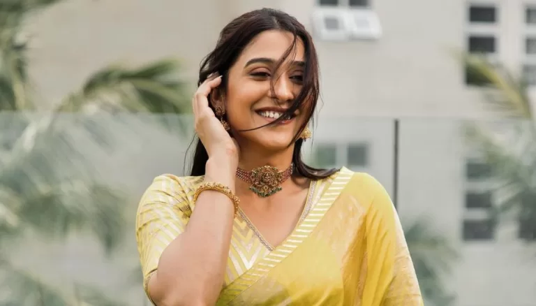 Regina Cassandra’s Allure in Yellow Drapes