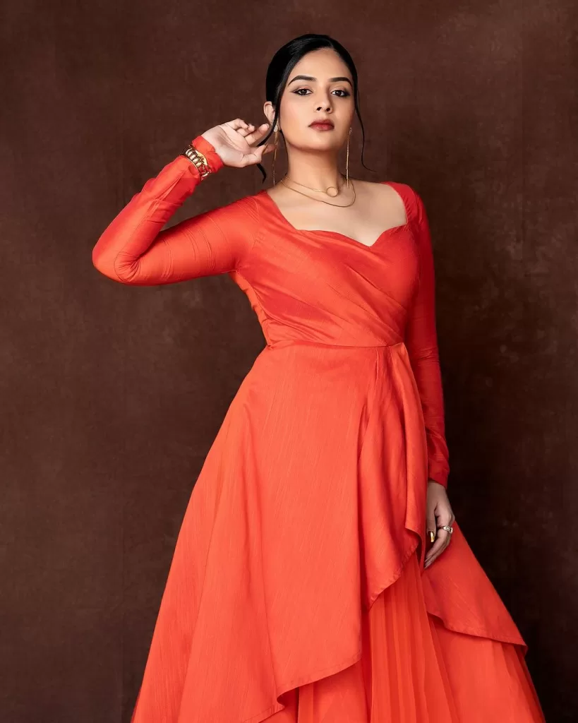 sreemukhi latest photos: stunning photoshoot in orange outfit