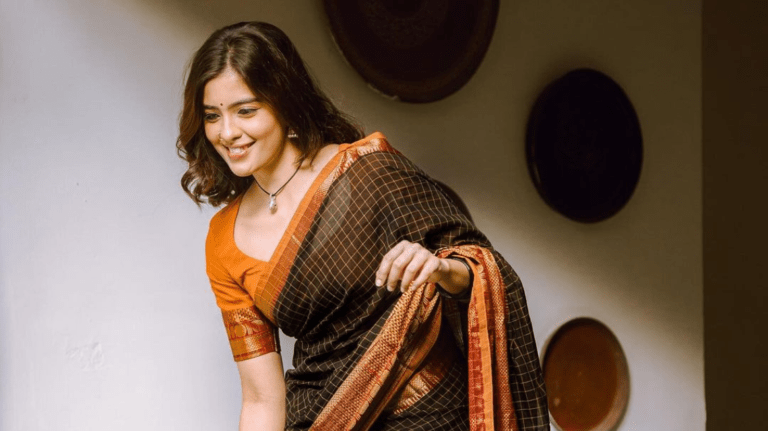 Amritha Aiyer looks charming in traditional saree attire.