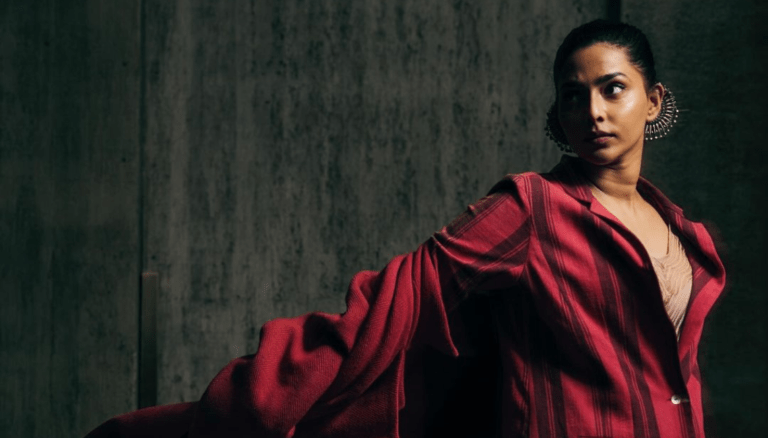 Aishwarya Lekshmi showcases her dynamic style in a captivating dark-themed ensemble.